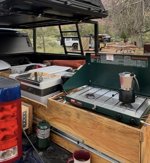 The slide-out camp kitchen and two-burner propane stove